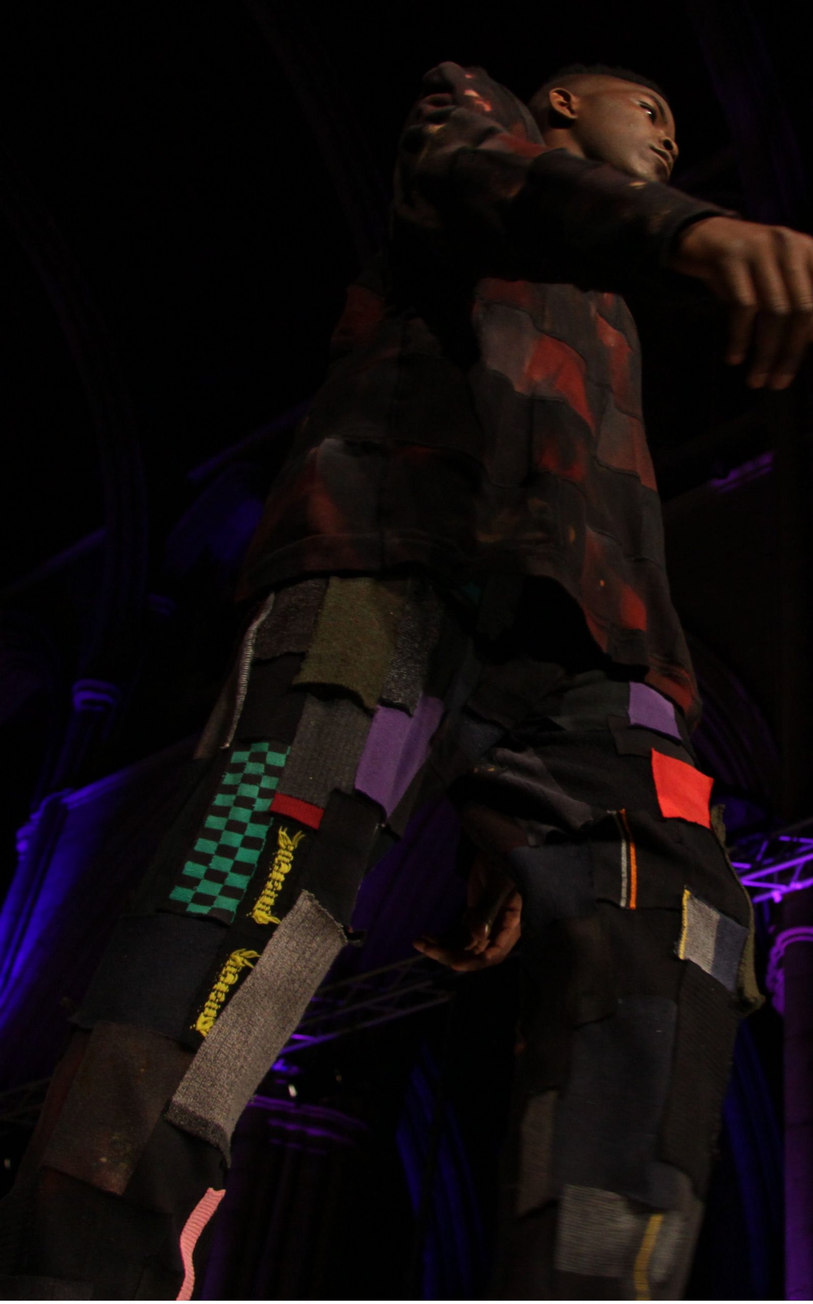 Tracey Dockree's "Rust" jumper and upcycled lounge pants Model wearing Tracey Dockree' s "Rust" jumper and upcycled loungepants on the catwalk at Brighton Fashion Week 2015