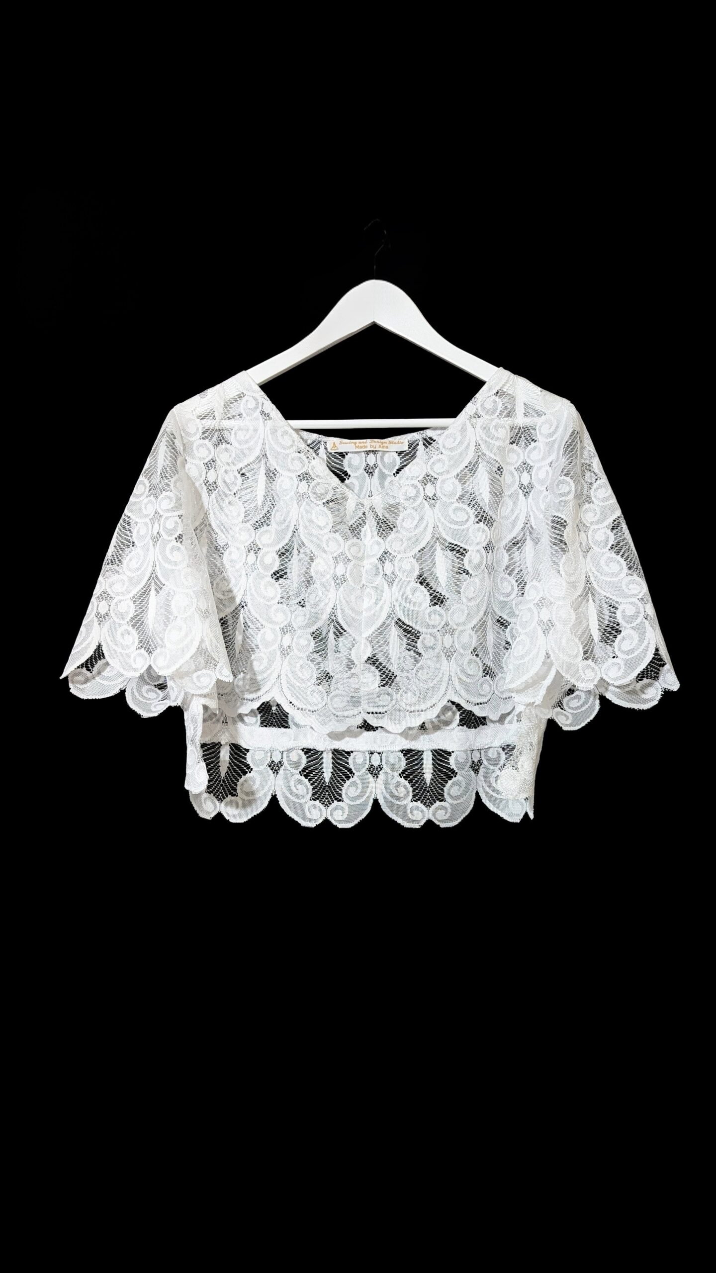 White peacock feather lace top