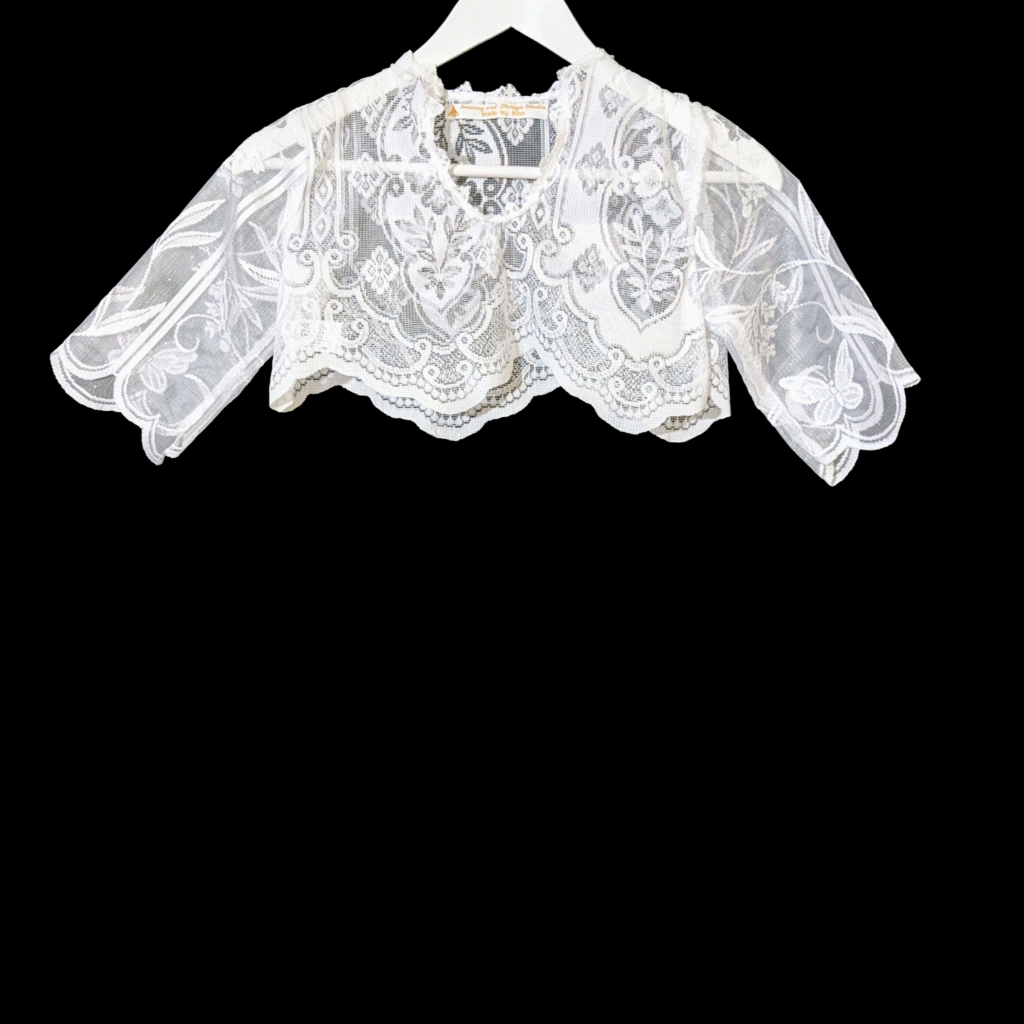 Asymmetrical Lace top with fleur de lyss and butterflies front